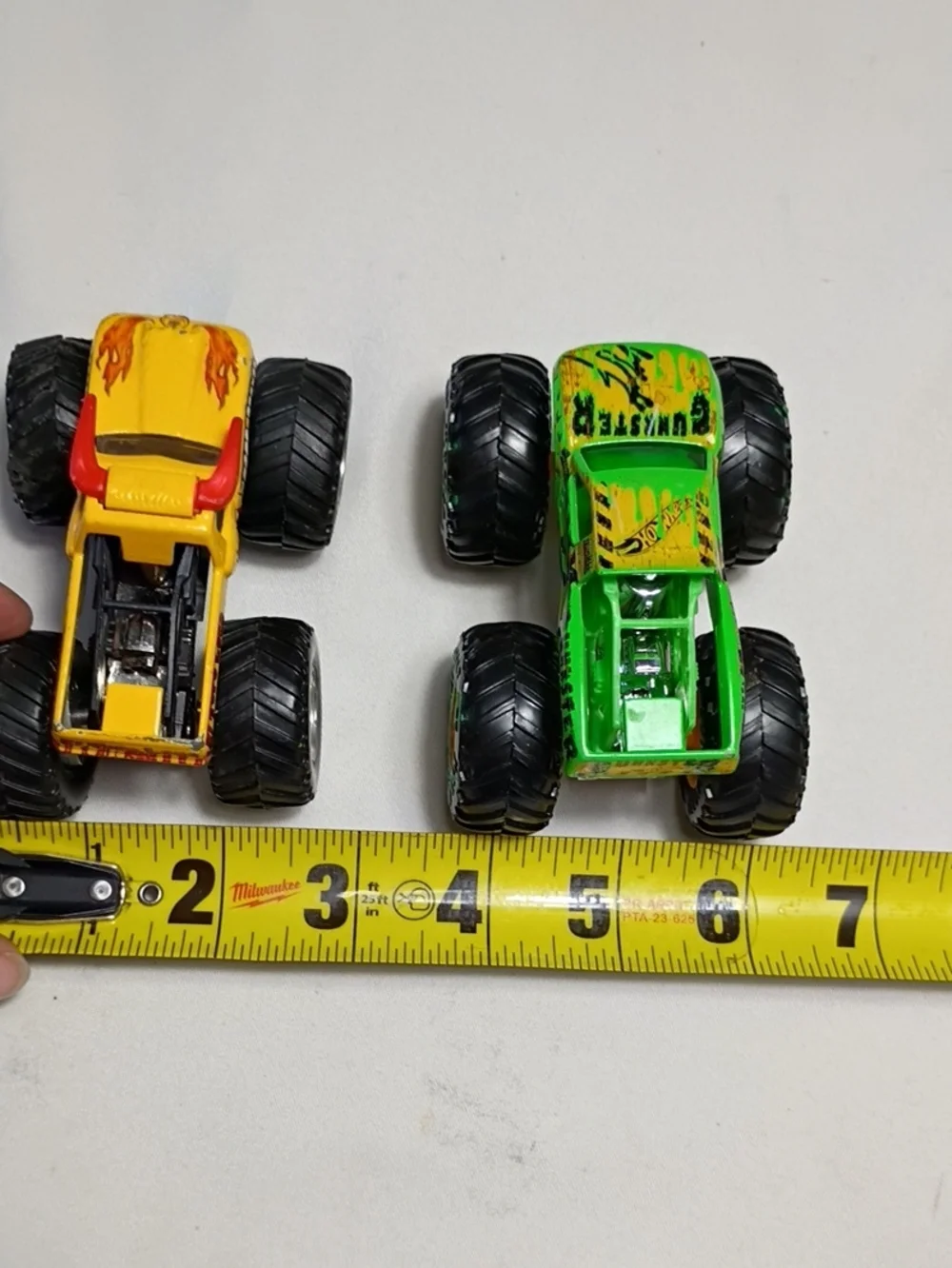 EUC Hot Wheels Monster Jam Set Of 2 El Toro Loco And Gunkster Monster Trucks
